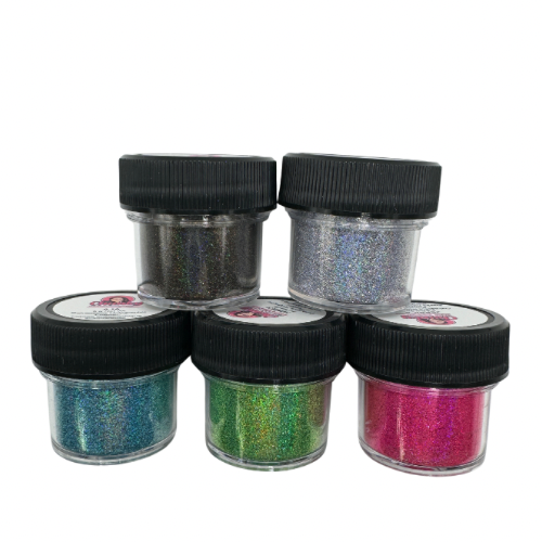A collection of all 5 of the outrageous holographic powders in jars.