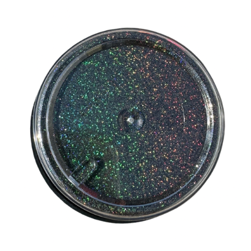 The bottom of jar of black holographic glitter powder.