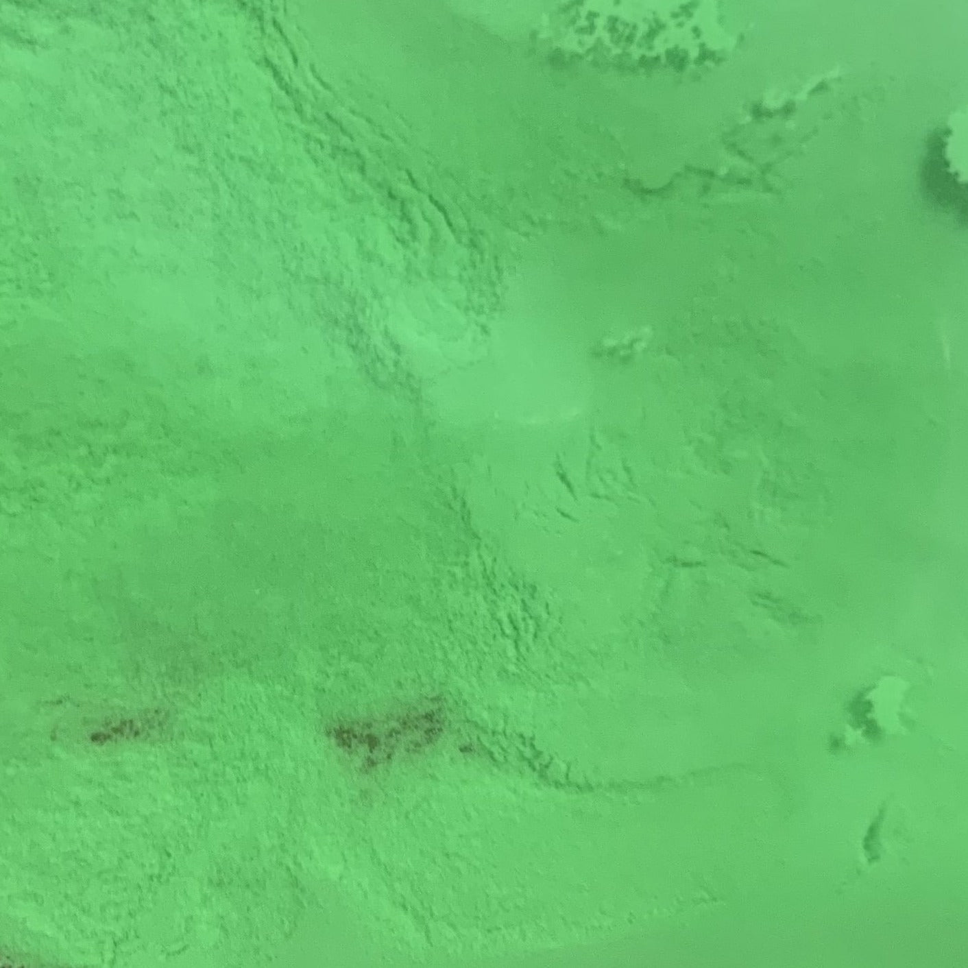 An image showing green glow in the dark powder.