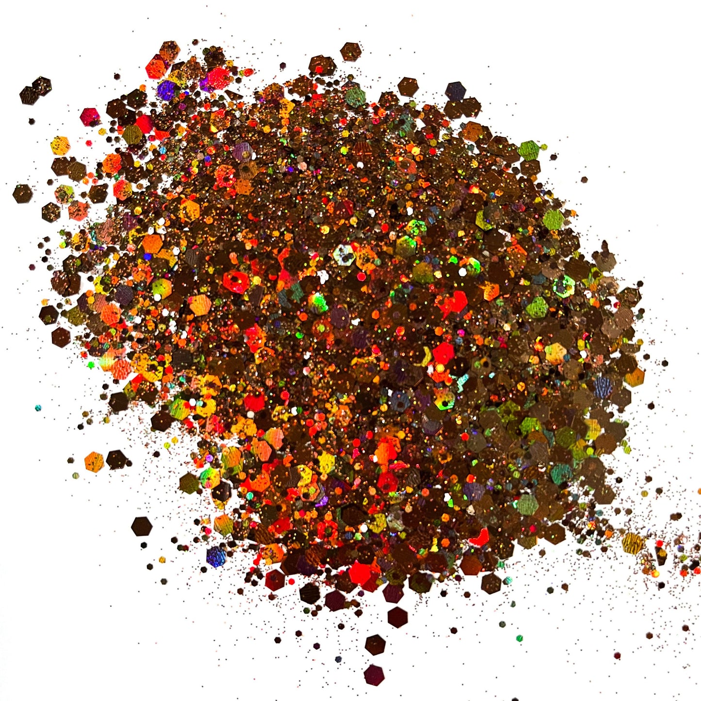 A pile of multicolored chunky glitter, ranging from brown to vibrant hues, spread out on a surface.