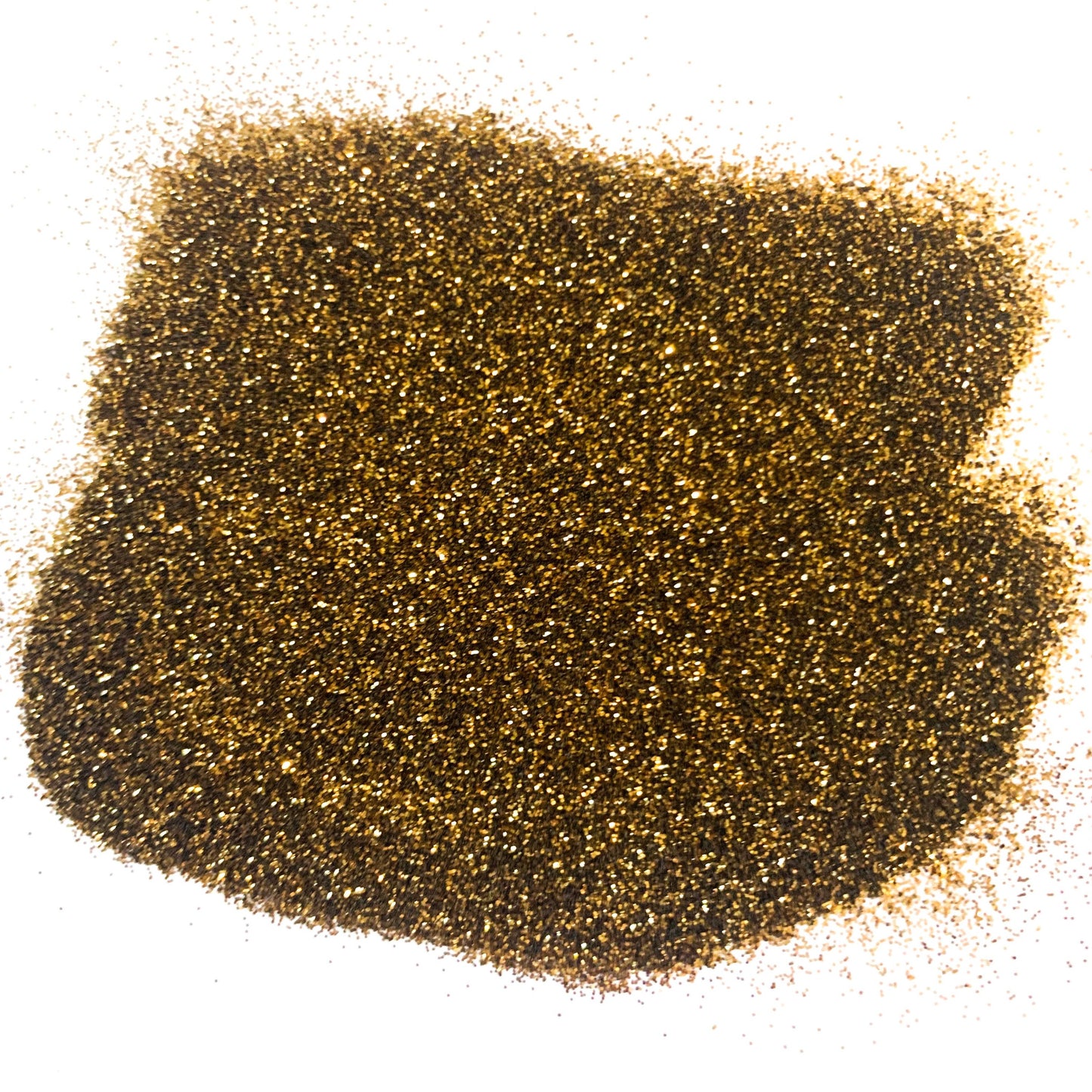 A pile of brown, extra fine glitter spread out on a surface.