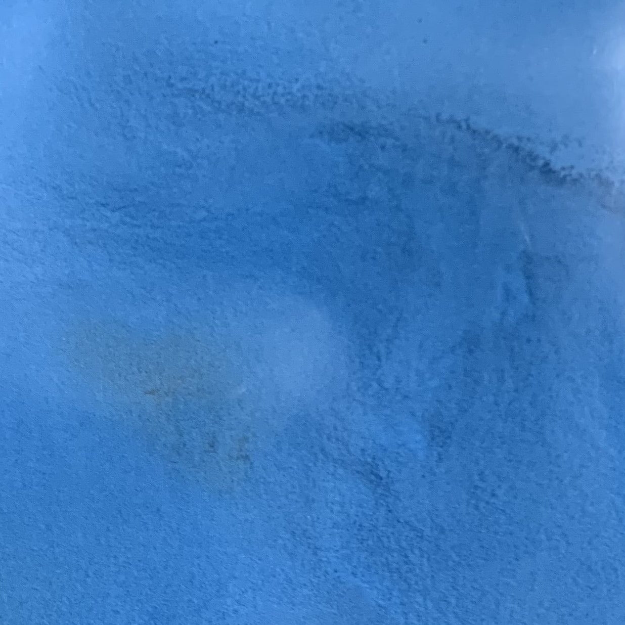 An image showing blue glow in the dark powder.