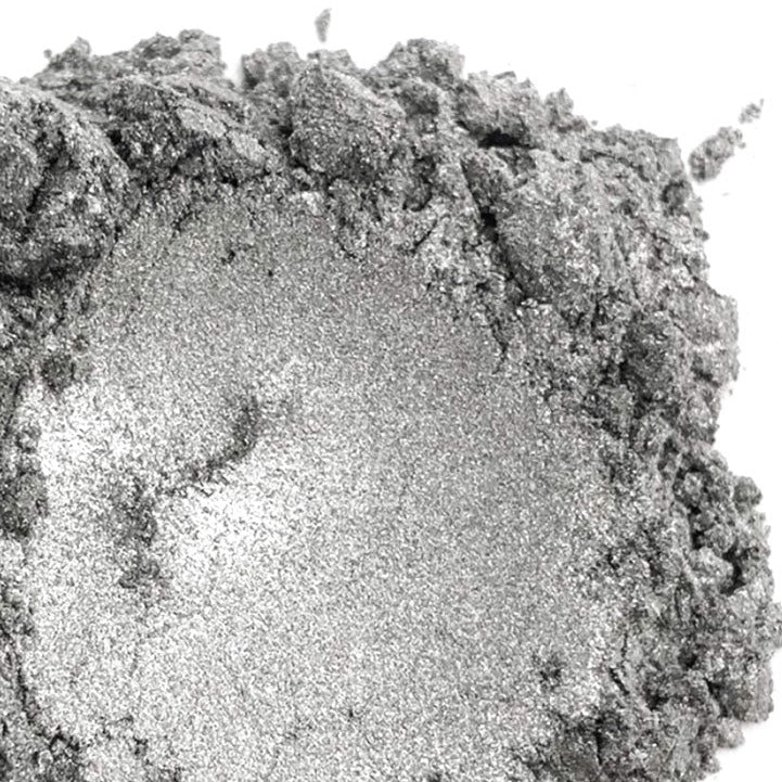 A close-up image of silver-colored mica powder with a metallic sheen.