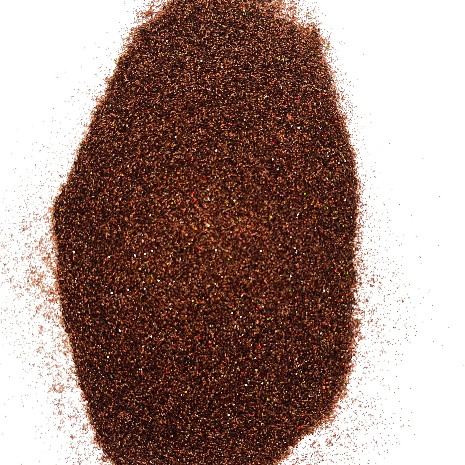 A pile of brown, extra fine glitter with a holographic finish.