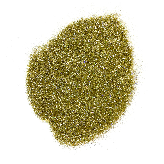 A pile of gold colored polyester glitter with a holographic finish.