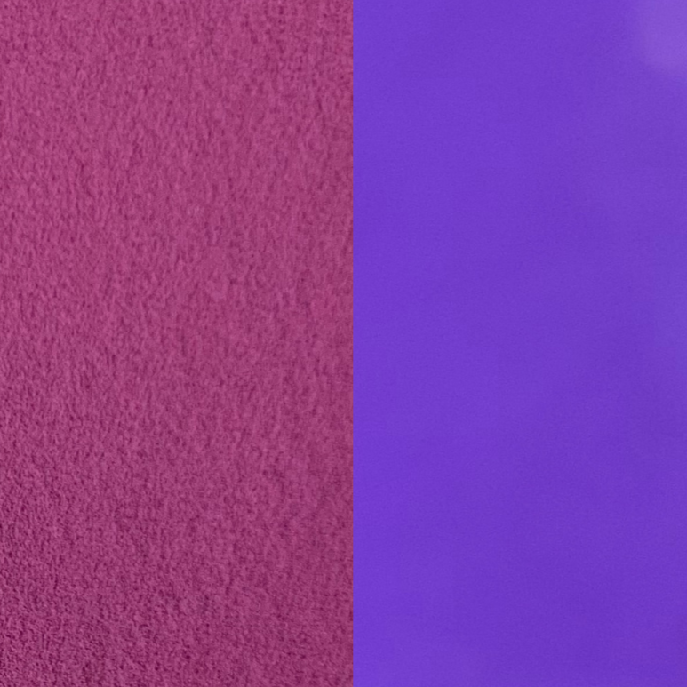 An image showing purple glow in the dark powder plain and glowing.