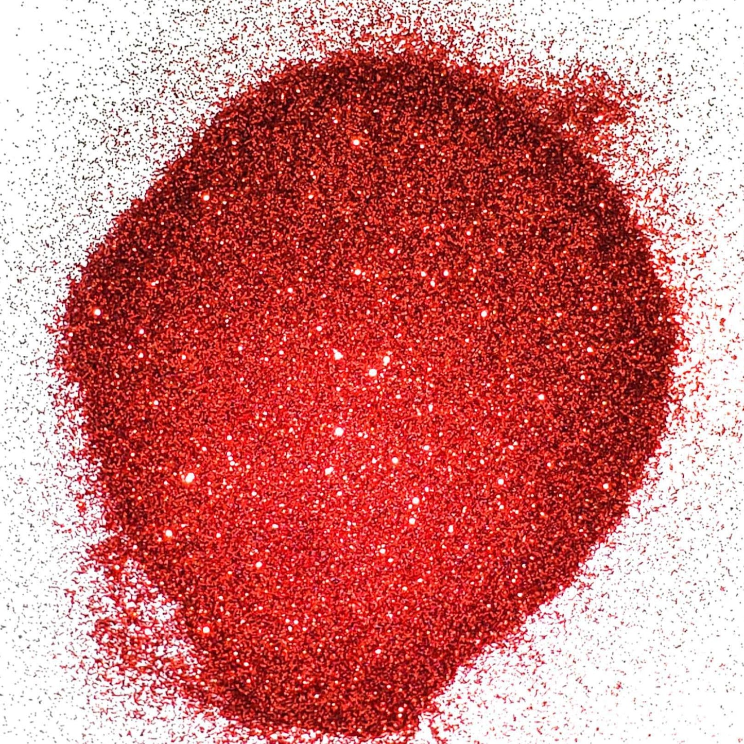 A pile of red metallic glitter, showing a shiny, reflective surface.