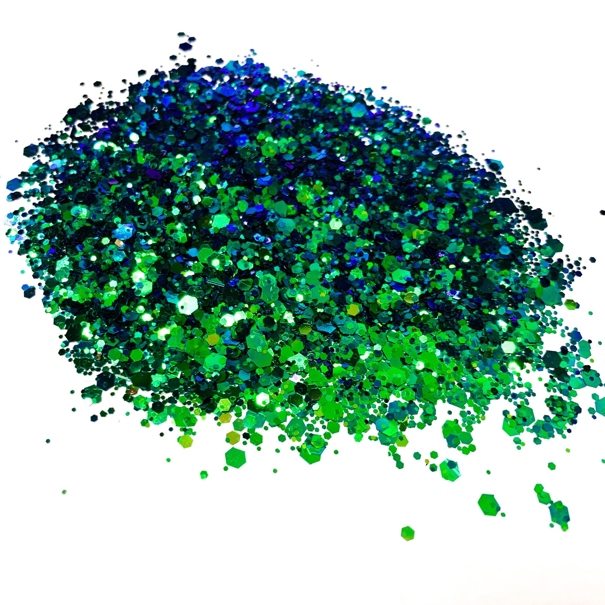 A green/blue chameleon colour shift glitter on a white background.