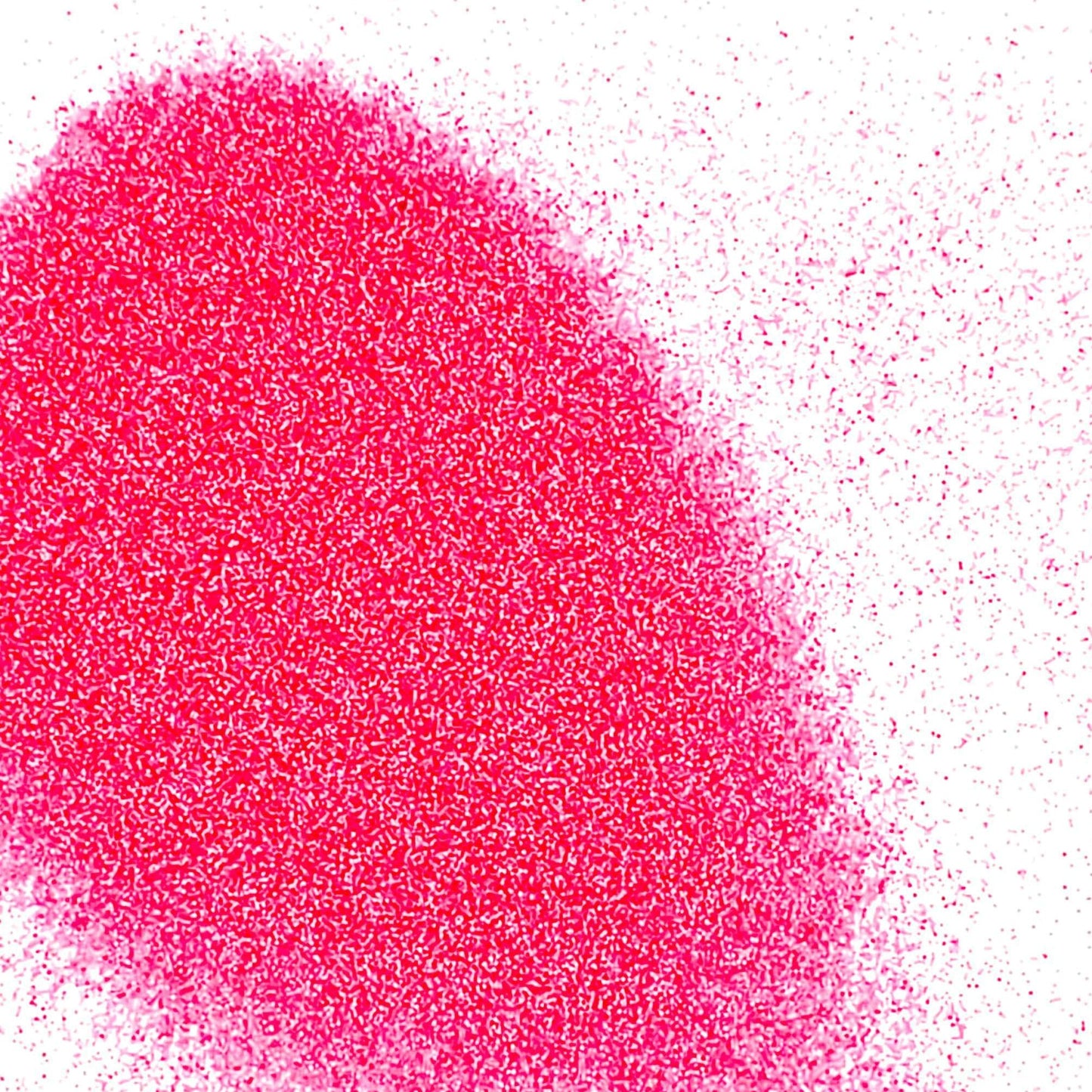 A pile of pink, matte finish polyester glitter.
