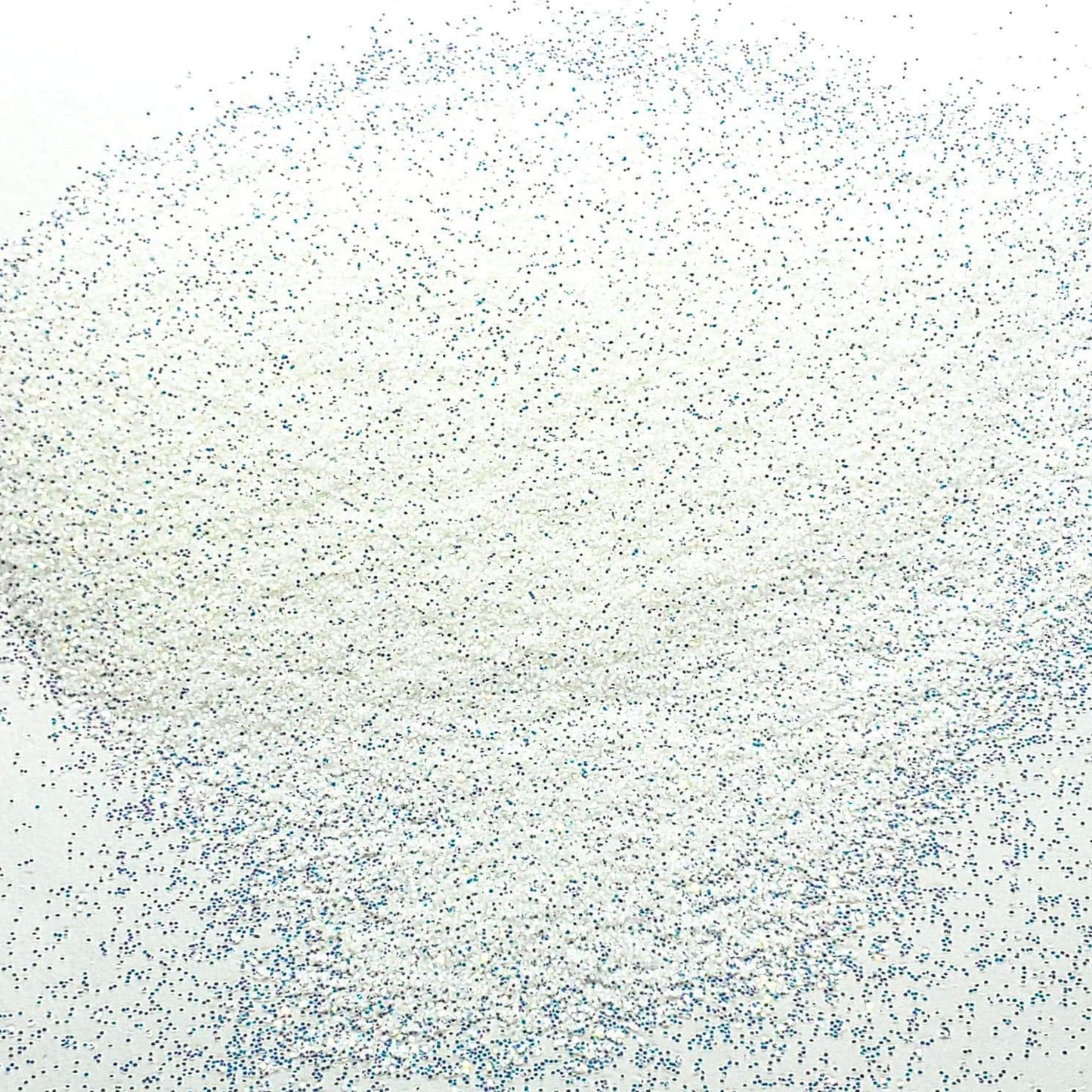 A close-up image of white iridescent glitter, showing the fine particles and reflective surfaces.