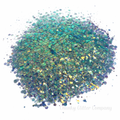 Blue iridescent chunky glitter on a white background with the branding "Chunky Glitter Company"