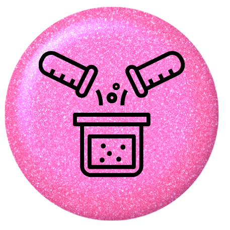 pink glitter button with 2 glass beakers pouring into a jar.