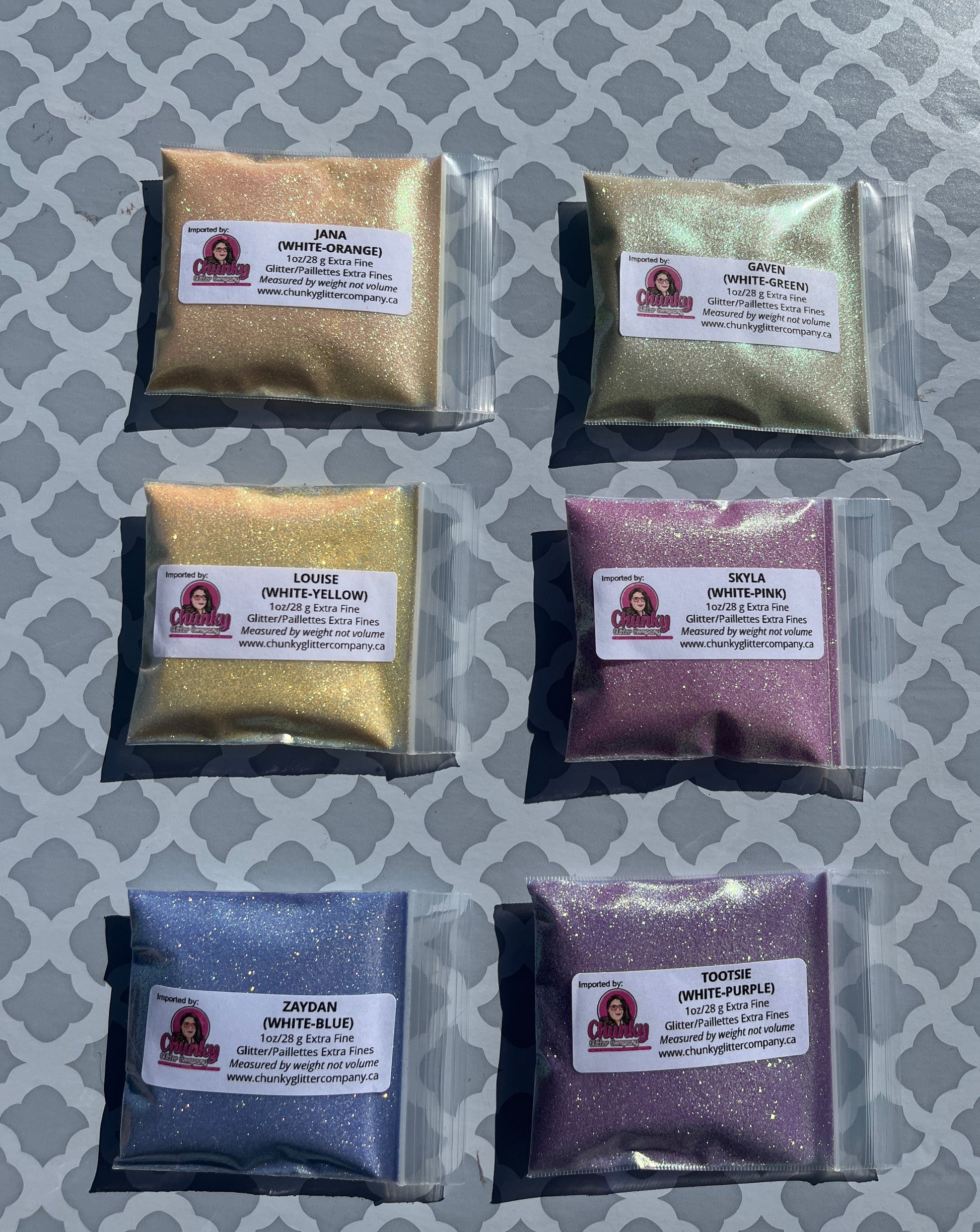 6 packages of extra fine glitter - orange, green, yellow, pink, purple, blue.