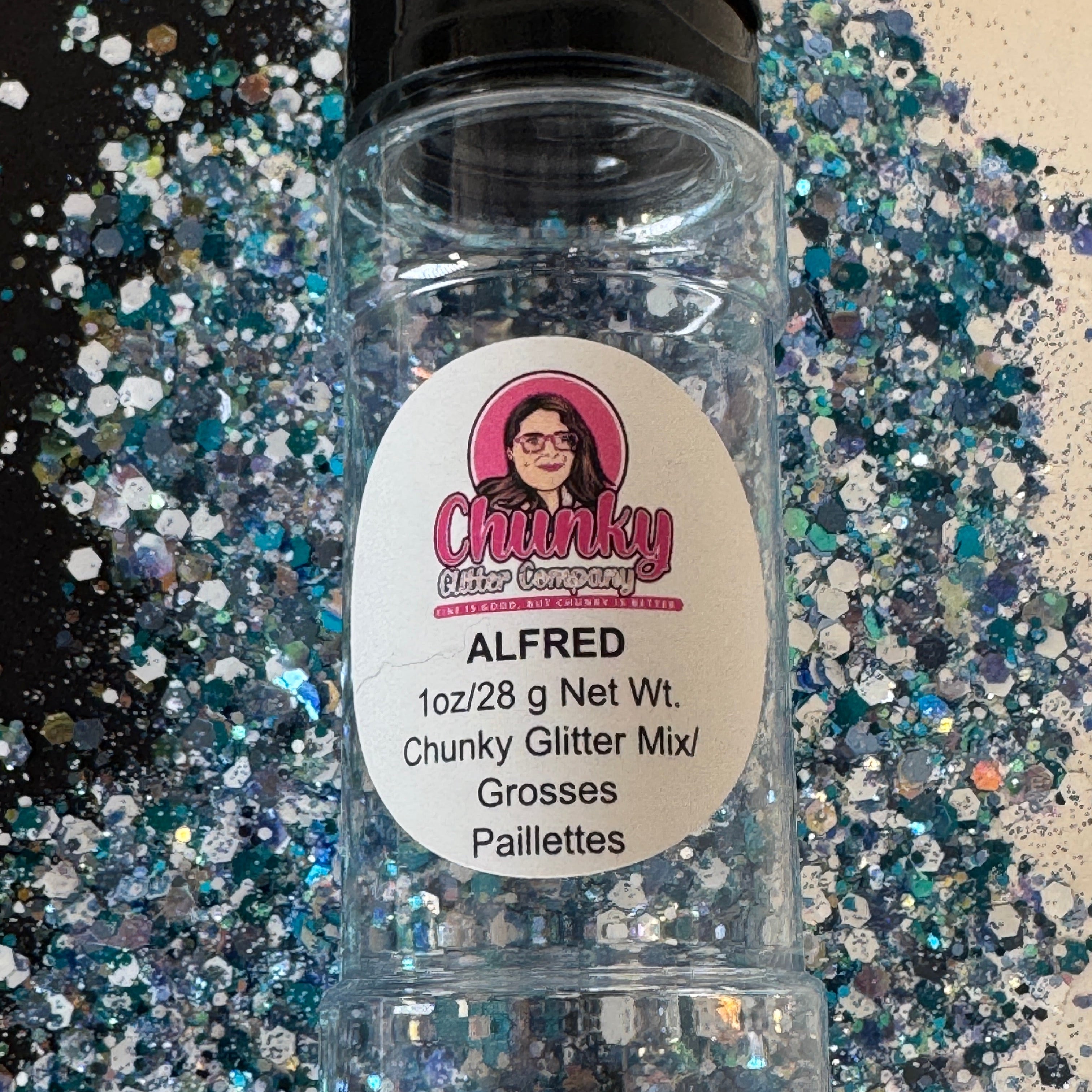 A clear plastic bottle with a label showing 'Alfred' by Chunky Glitter Company, containing a Light White/Blue chunky glitter mix.