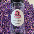 A clear plastic bottle with a label showing 'Nancy' by Chunky Glitter Company, containing a Purple chunky glitter mix.