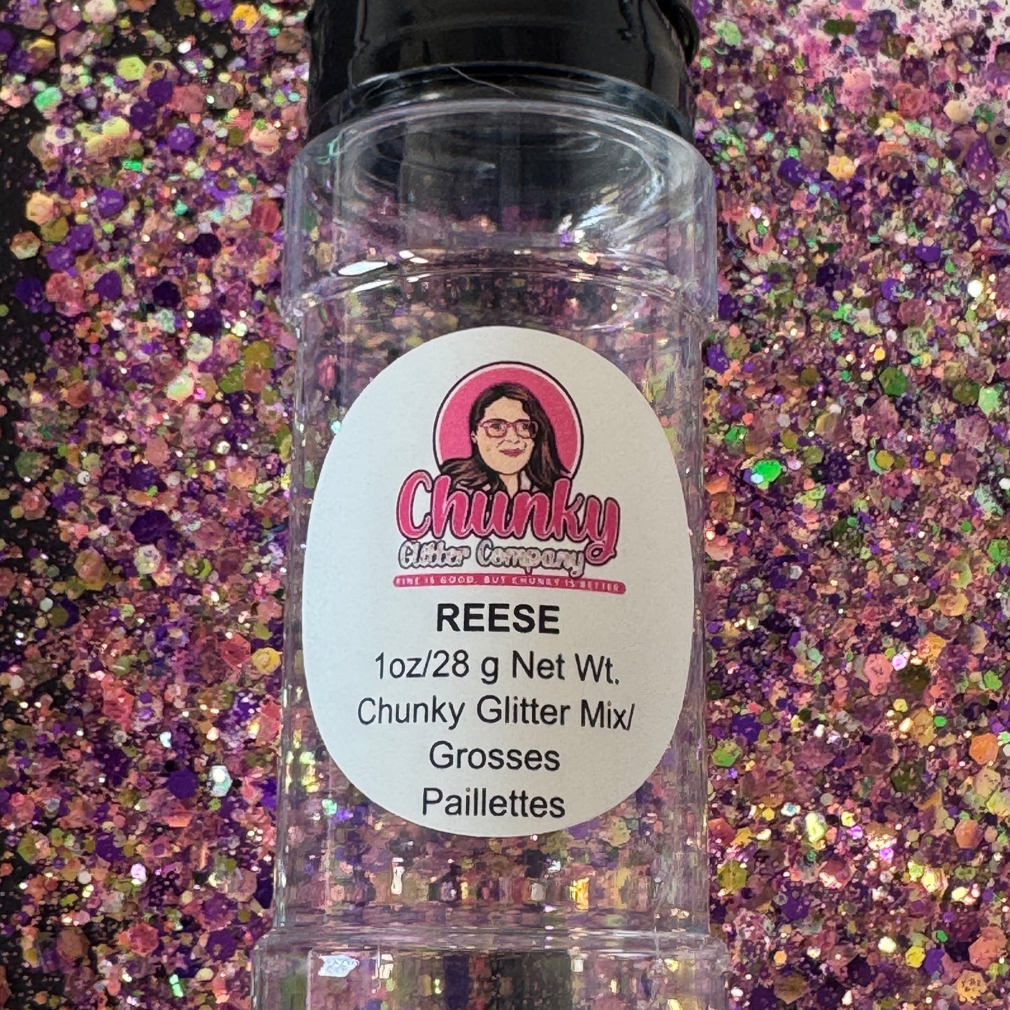 A clear plastic bottle with a label showing 'Reese' by Chunky Glitter Company, containing a Pink/Purple/Green chunky glitter mix.