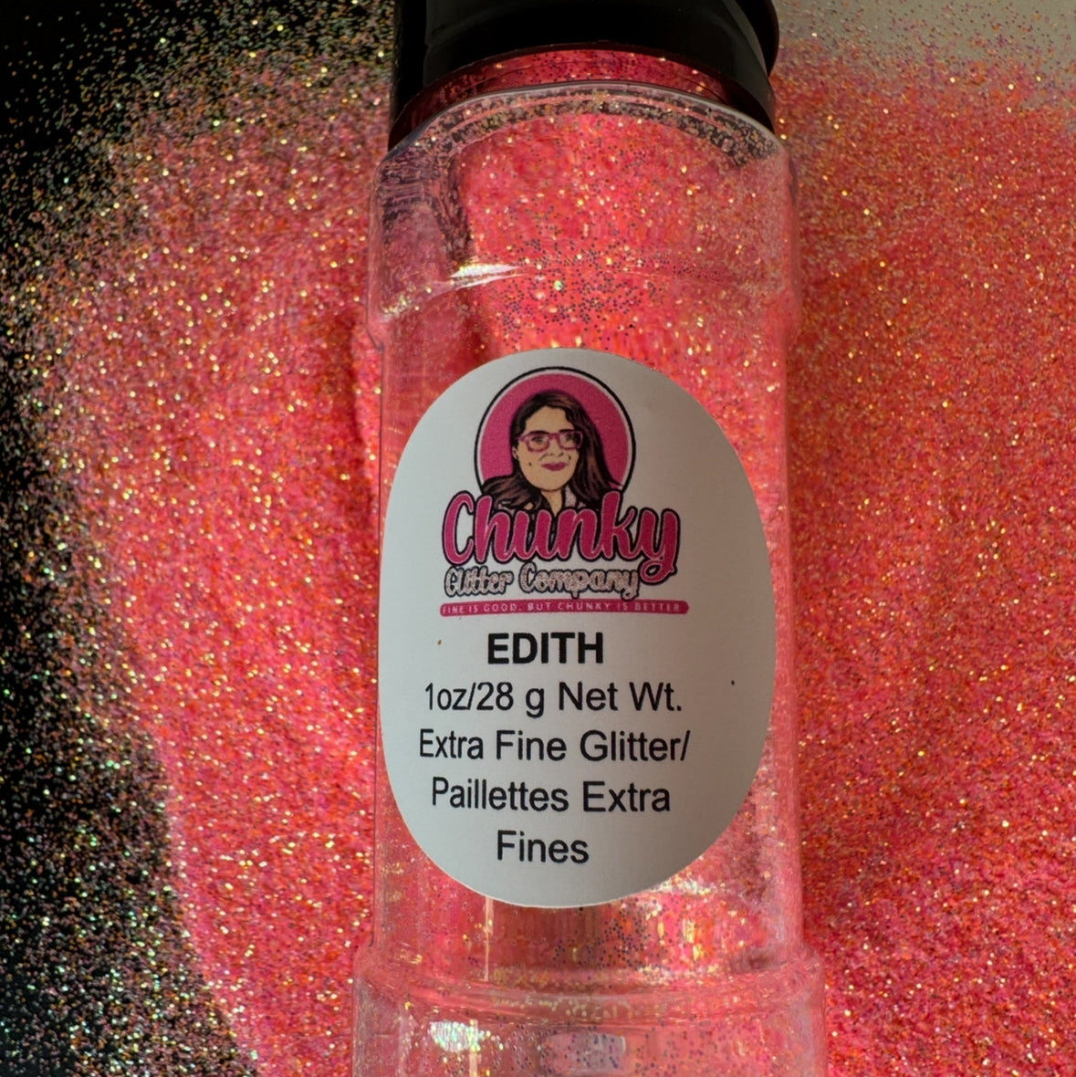 A clear plastic bottle with pink glitter inside, labeled 'Edith' from Chunky Glitter Company.
