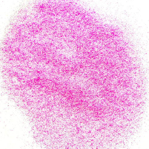 A close-up image of pink polyester glitter, showing the texture and color of the glitter particles.