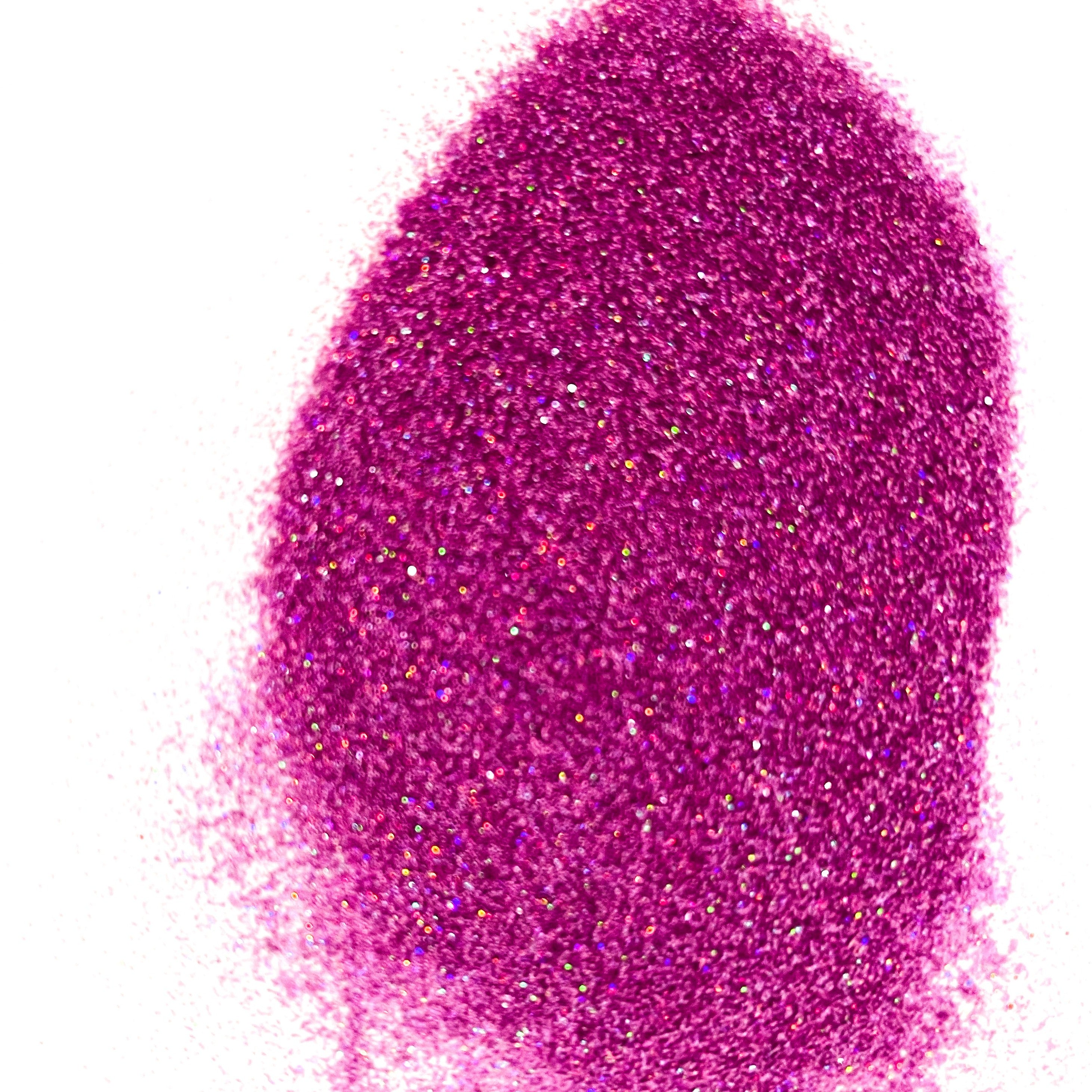 A close-up image of purple holographic glitter, showing the texture and sparkle of the product.