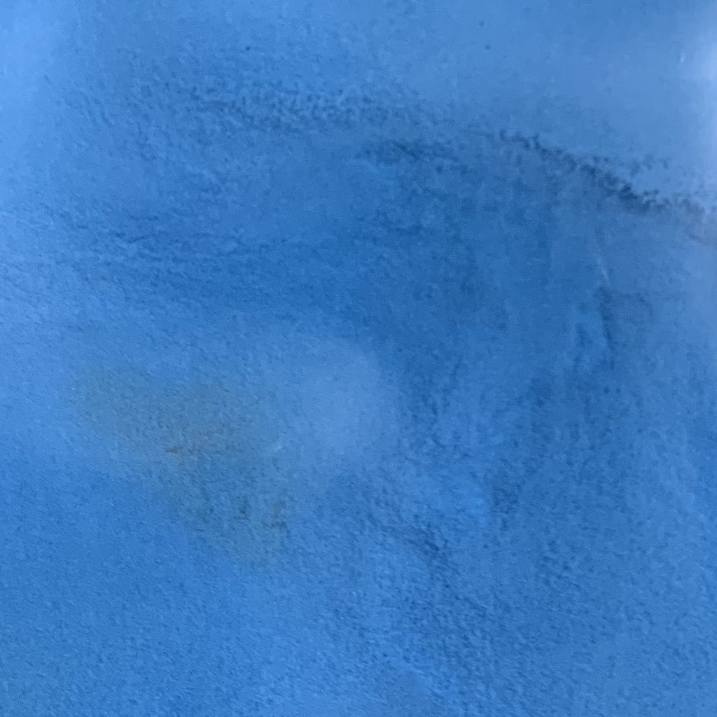 An image showing blue glow in the dark powder.