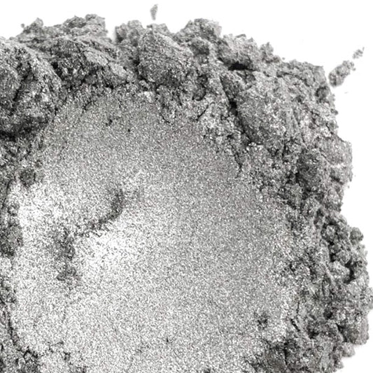 A close-up image of silver-colored mica powder with a metallic sheen.