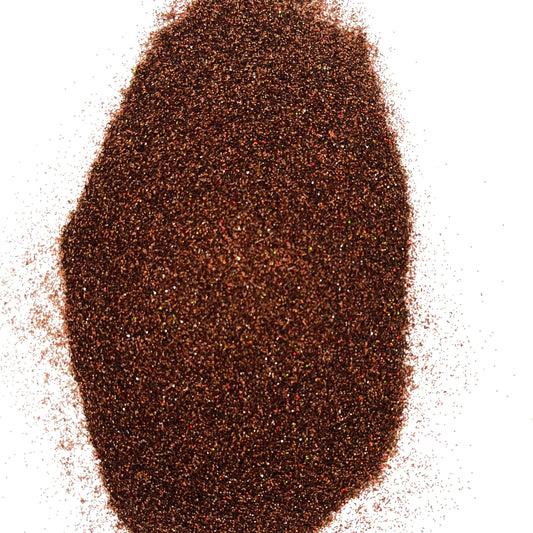 A pile of brown, extra fine glitter with a holographic finish.