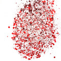 A close-up image of a red and white chunky mix glitter, displaying various sizes of particles against a white background.