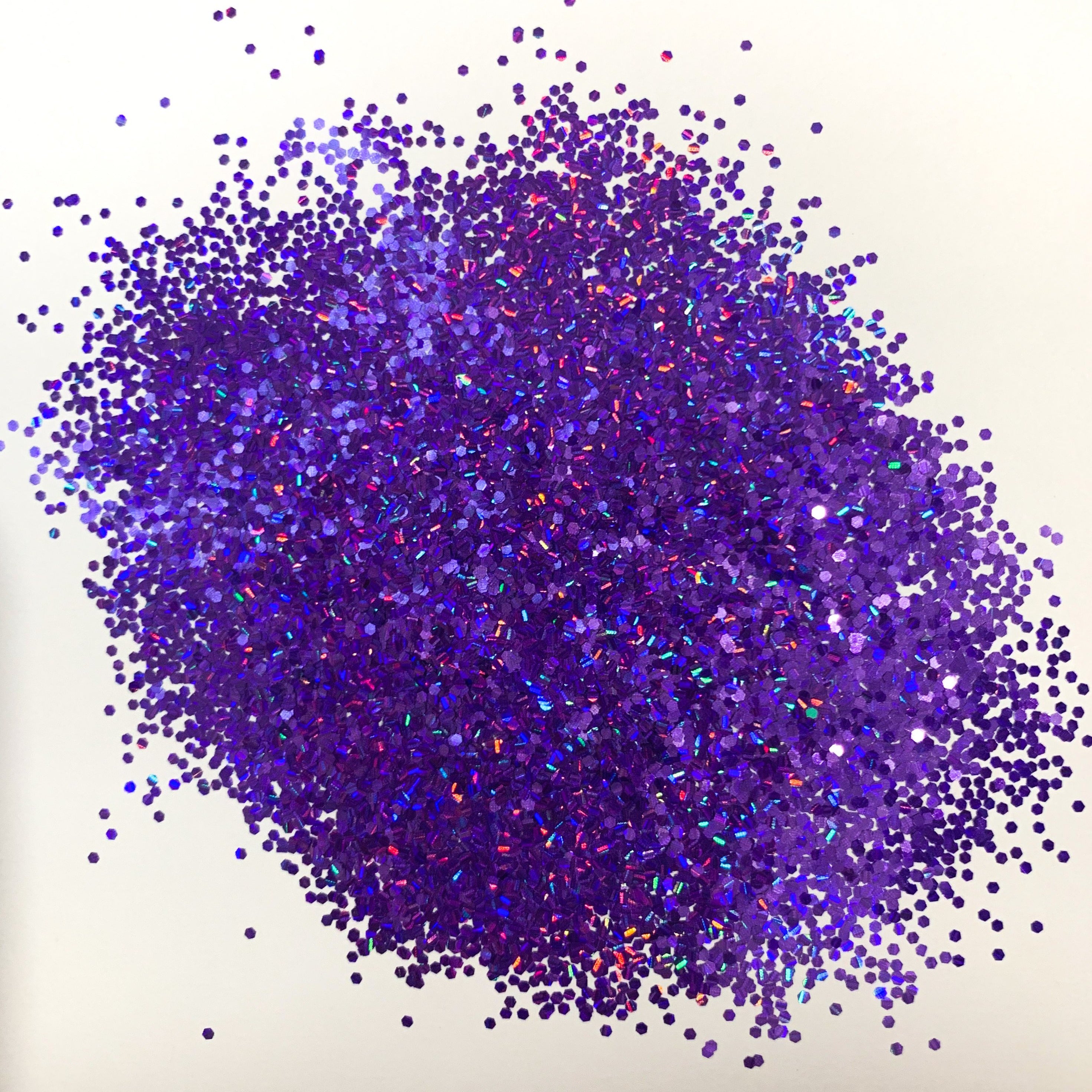 A pile of purple holographic polyester glitter.