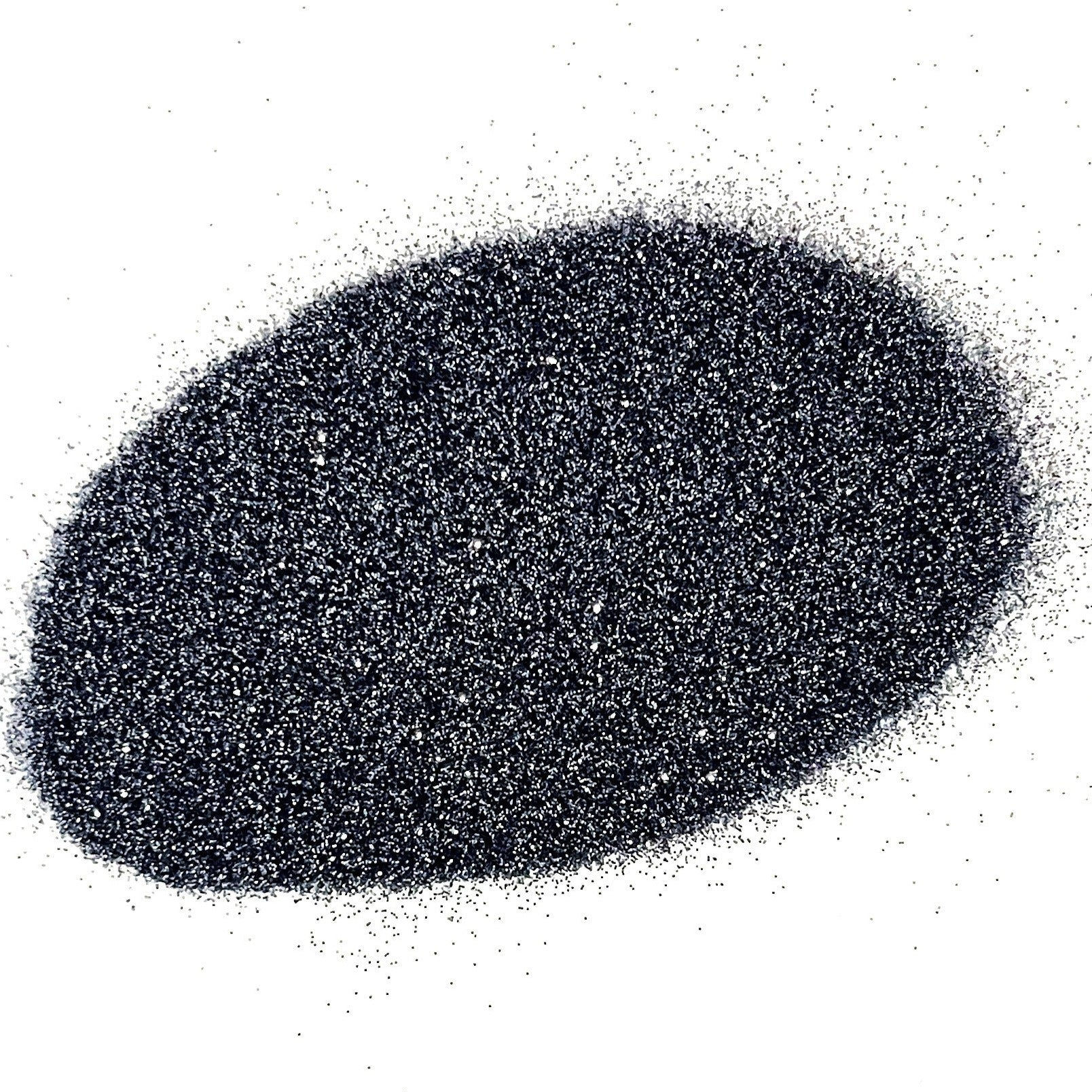 A pile of dark gray to silver gradient polyester glitter, with varying shades due to light reflection.