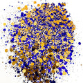 A pile of mixed colours of chunky glitter, including Indigo/Bronze, on a white background.