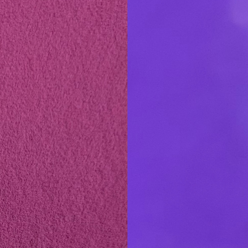 An image showing purple glow in the dark powder plain and glowing.
