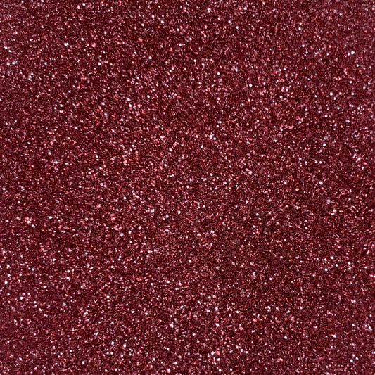 A close up red and pink extra fine glitter mix.