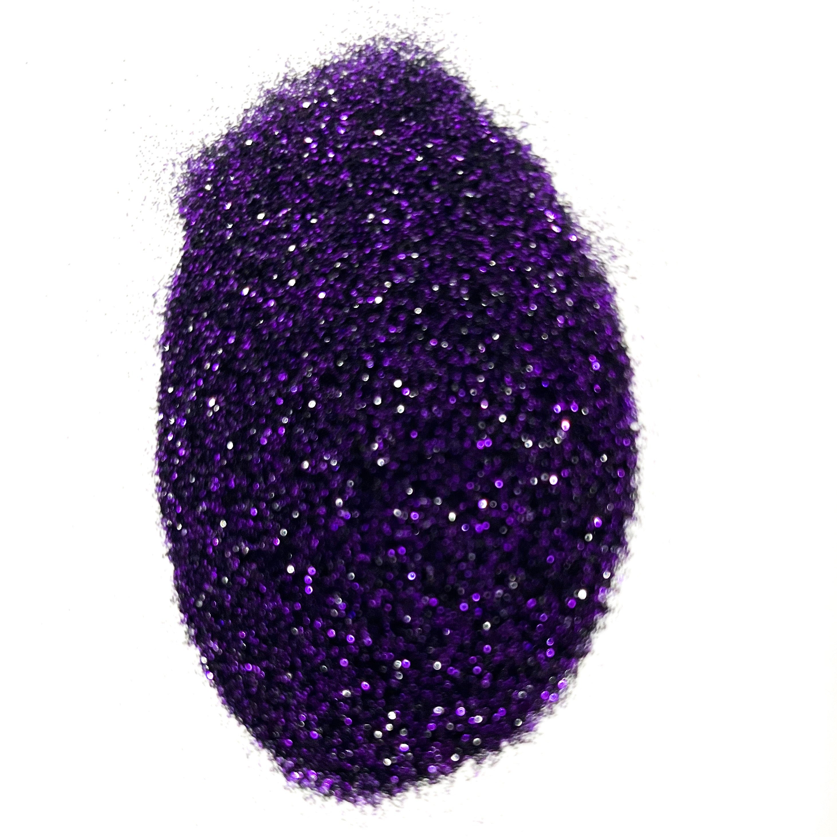A close-up image of purple polyester glitter with a focus on showing the texture and color of the product.
