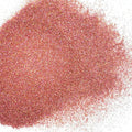 A pile of pink holographic polyester glitter.