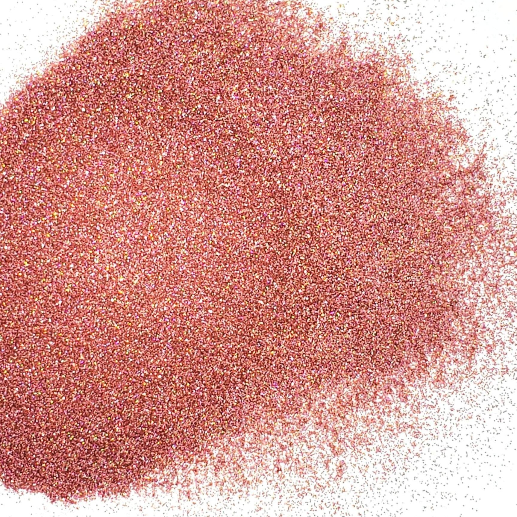 A pile of pink holographic polyester glitter.