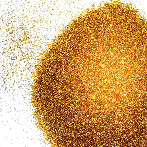 A pile of extra fine, metallic gold glitter against a white background