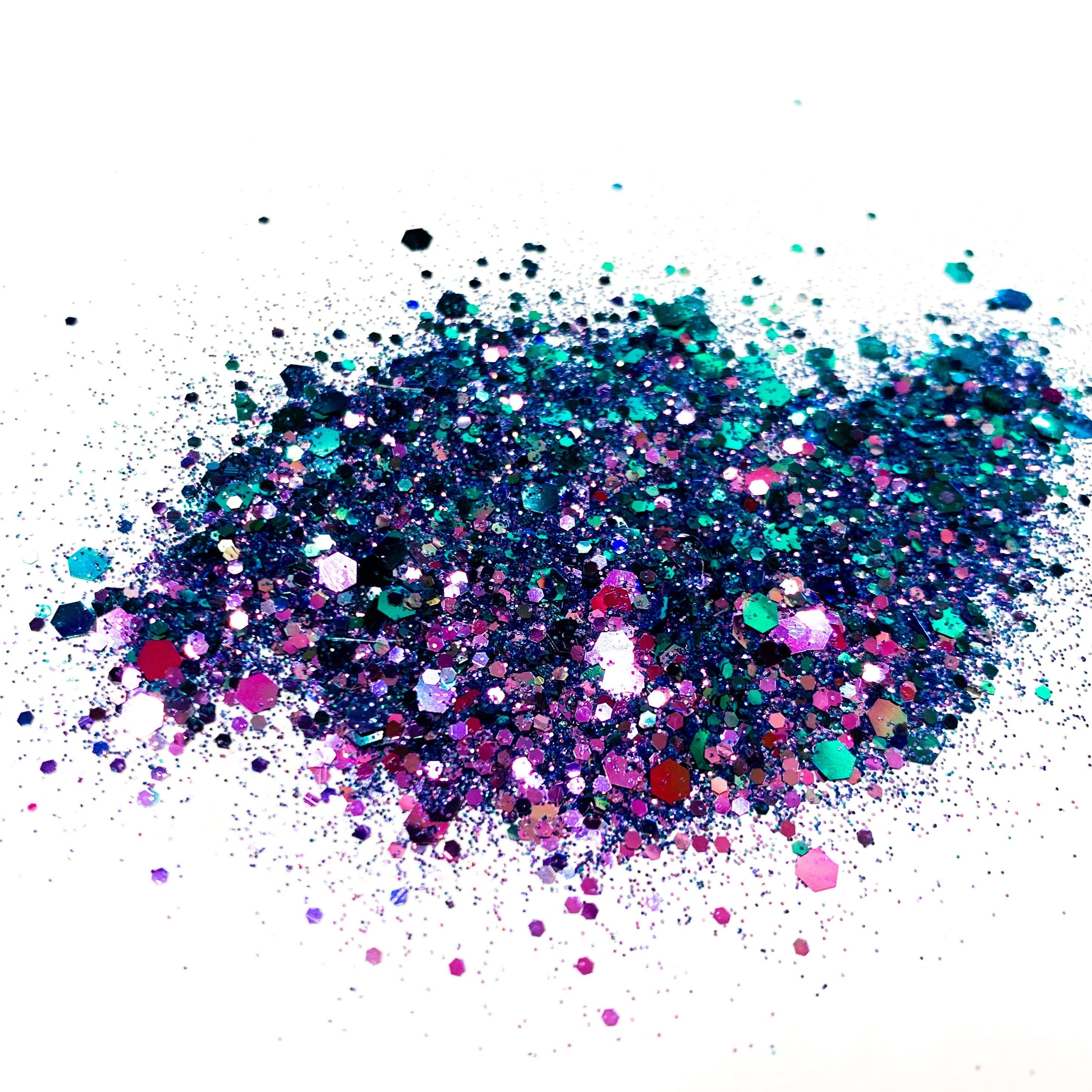 A blue/purple chameleon colour shift  glitter on a white background.