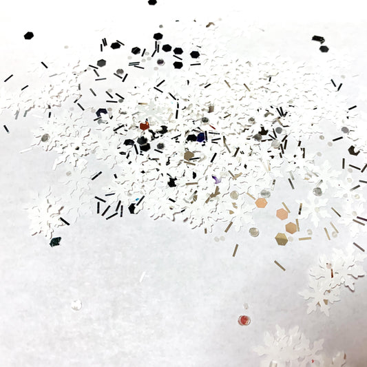 White snowflakes with mirrored silver accents.