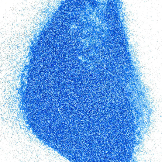 A pile of blue extra fine fluorescent glitter, with a matte finish.