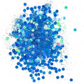 A blue holographic chunky mix on a white background.