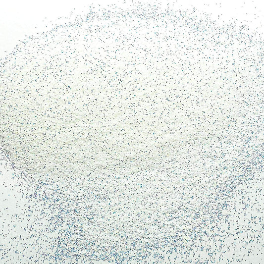 A close-up image of white iridescent glitter, showing the fine particles and reflective surfaces.