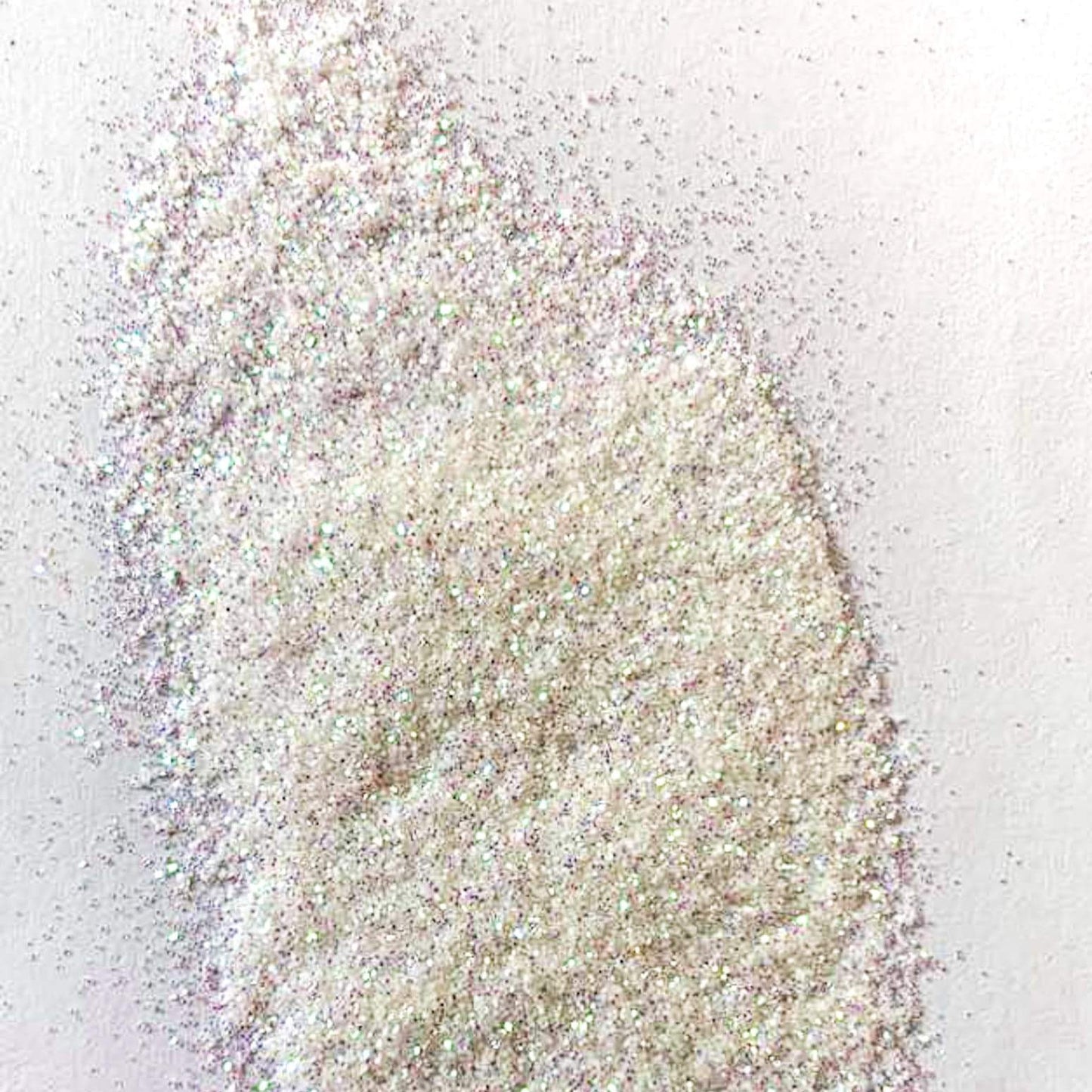 A white extra fine glitter on a white background.