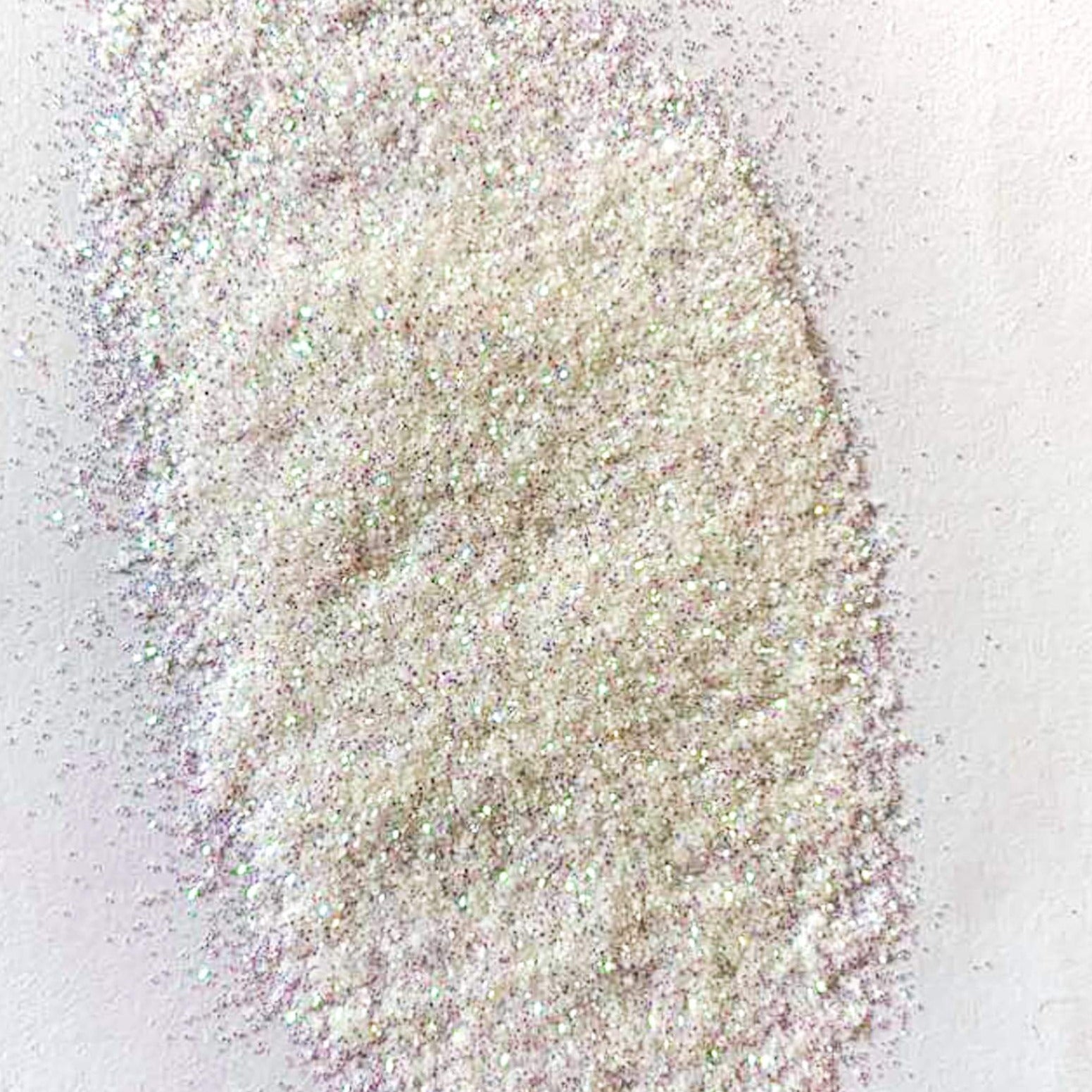 A white extra fine glitter on a white background.