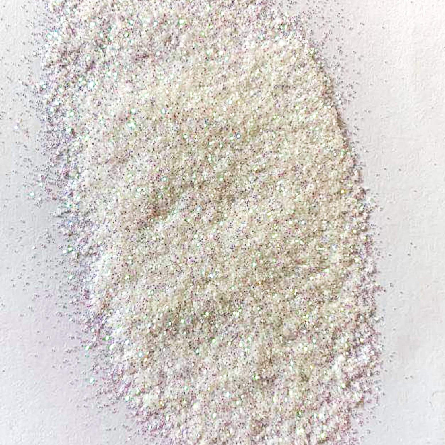 A white extra fine glitter on a white background.